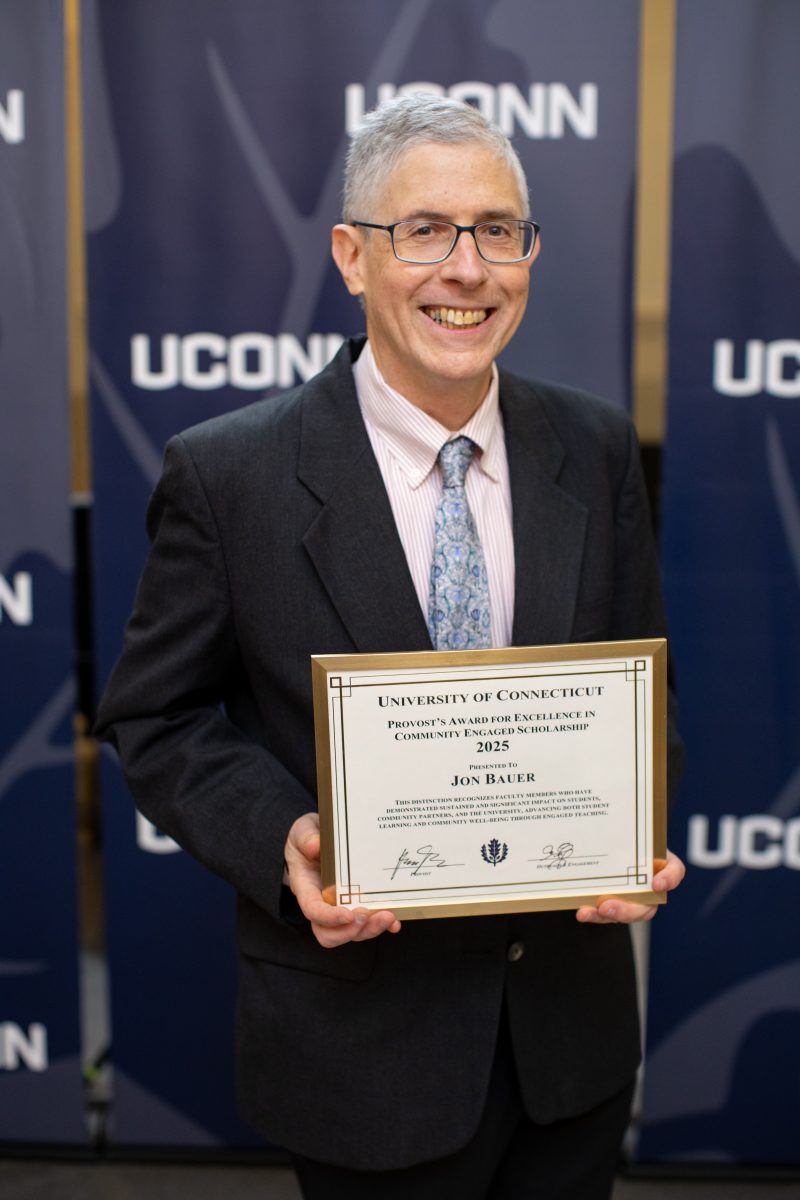 A gentleman posing for a picture. 