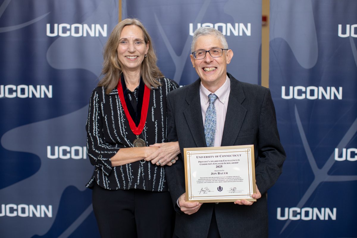 Two people posing for a picture.