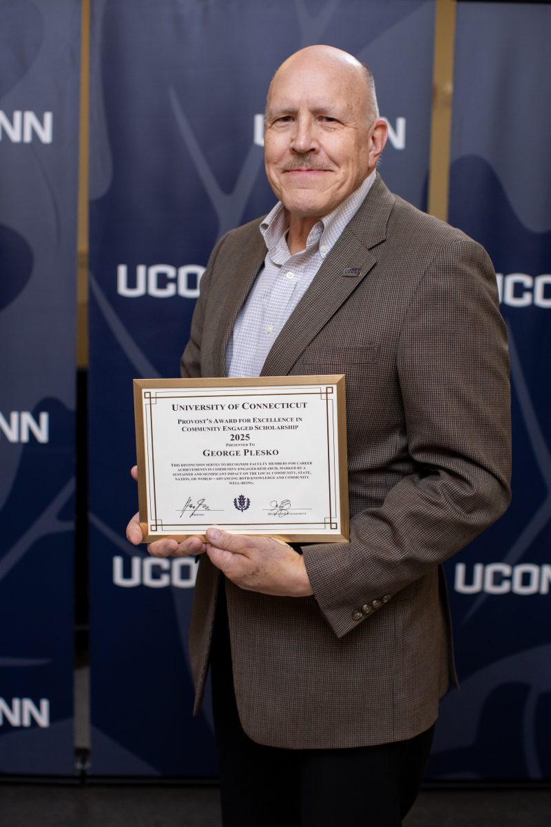 A gentleman posing for a picture.