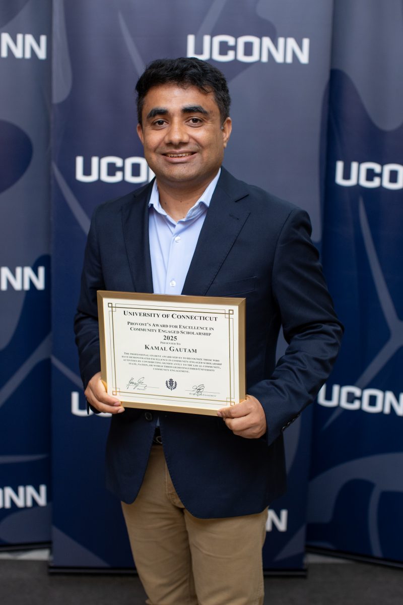 A gentleman posing for a picture.