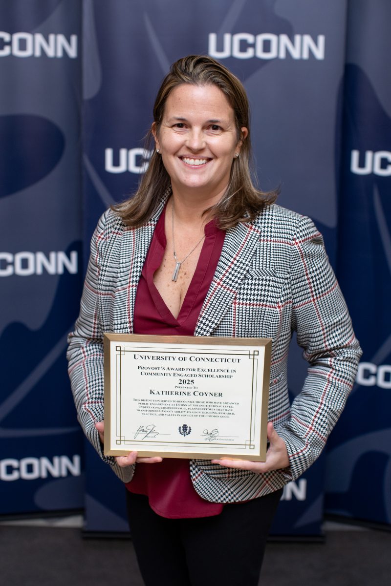 A lady posing for a picture.